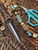 Custom Sculpted Richlite Micarta Bead with Turquoise Blue and White Liners on Matching Camo 550 Cord Accented by Brass Winged Helmet and Two-Tone Mini Cord Cobra Wrap