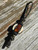 Gnarly Bark Elk Antler, Black/Gold Web Tru-Stone, and Amboyna Burl Medallion Bead Knife Nub On Black/Gold Cord Accented by Brass and Lava Rock