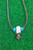 Polished Elk Antler Pendant with Turquoise and Brass Accent Beads on Dark Brown Lace Leather Polished Elk Antler Pendant with Turquoise and Brass Accent Beads on Dark Brown Lace Leather