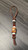 Leather Knife Lanyard with Elk Antler, Olive Wood, White Howlite, and Red Carnelian Beads Leather Knife Lanyard with Elk Antler, Olive Wood, White Howlite, and Red Carnelian Beads