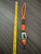 Bright Orange Paracord Knife Lanyard with Black Skull And Black, White, Gray Marbled Acrylic Handcrafted Bead Bright Orange Paracord Knife Lanyard with Black Skull And Black, White, Gray Marbled Acrylic Handcrafted Bead