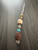 Brass Gladiator Helmet Bead Knife Lanyard with Thick Elk and Hand Shaped Walnut Bead on Silver Desert Paracord Brass Gladiator Helmet Bead Knife Lanyard with Thick Elk and Hand Shaped Walnut Bead on Silver Desert Paracord