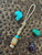 Gold Web Turquoise Tru-Stone and Koa Wood Split Bead Knife Lanyard with Brass Wrapped Feather Bead on Desert Camo Paracord Gold Web Turquoise Tru-Stone and Koa Wood Split Bead Knife Lanyard with Brass Wrapped Feather Bead on Desert Camo Paracord