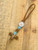 Gnarly Bark Collection Cross Cut Deer Antler Medallion and Tine Leather Knife Lanyard with Turquoise and Brass Accents