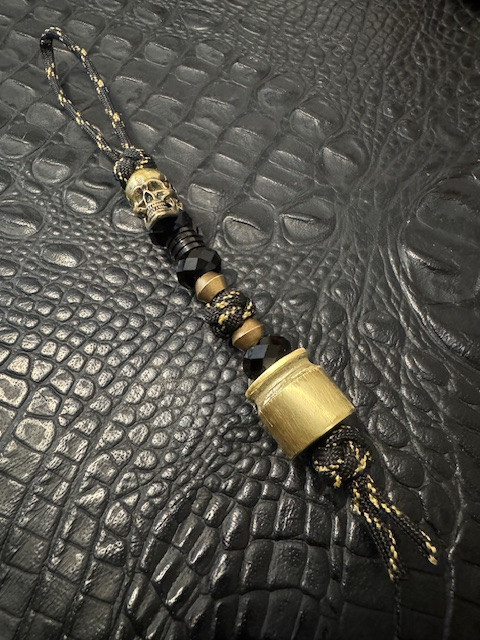 Casings Collection 50 Cal Bead Lanyard with Polished Brass Skull