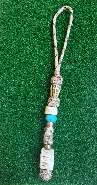 Brass Cross Bead and Polished Elk Antler Knife Lanyard with Turquoise Accents On Desert Camo Paracord