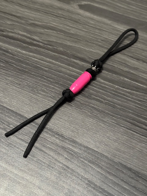 Shorty Knife Nub - Pink Metal EDC Bullet Shaped Bead with Crown and Faceted Black Accents on Black Paracord