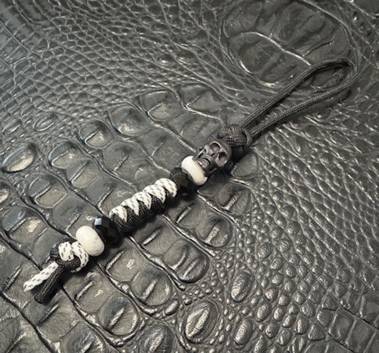 Black and White Two-Tone Paracord Knife Lanyard with Black Metal Skull Bead