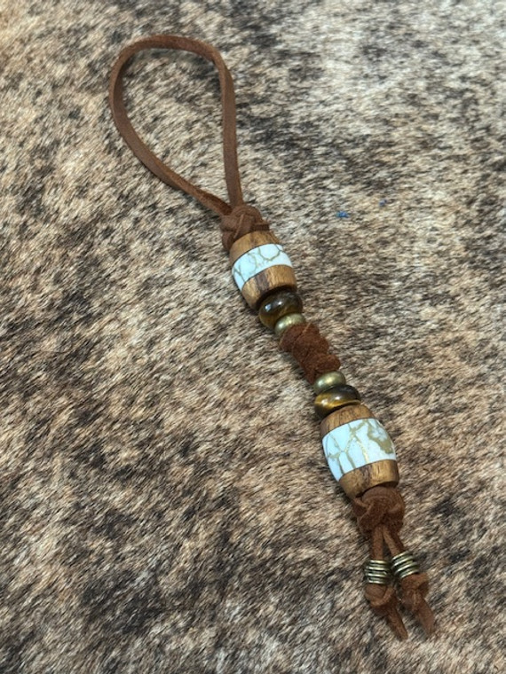 Teak and Gold Web Tru-Stone Split Bead Knife lanyard with Brass and Tiger's Eye Accents on Leather Teak and Gold Web Tru-Stone Split Bead Knife lanyard with Brass and Tiger's Eye Accents on Leather