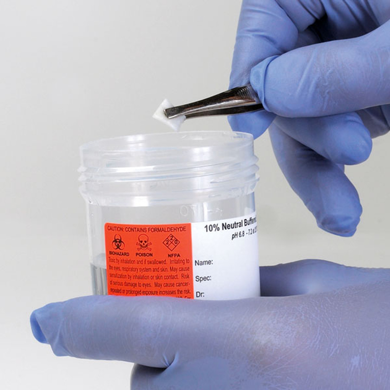 Formalin Filled Tite-Rite™ Container in application
