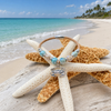 Sterling silver crab cork bracelet with ceramic beads on starfish on Florida Gulf Coast beach — handcrafted Florida artisan jewelry — Crabby Mermaid