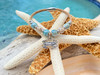 Sterling silver crab cork bracelet with ceramic beads displayed on starfish — handcrafted Florida artisan jewelry — Crabby Mermaid