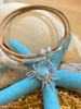 Larimar crab cork necklace with sterling silver tubes and magnetic ball clasp displayed on blue starfish ‚Äî Crabby Mermaid