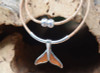 Front view of Hawaiian Koa wood whale tail necklace with sterling silver tube accents on cork — handcrafted in Florida