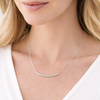 Sterling silver curved rondelle bar necklace styled on neck — handcrafted USA minimalist jewelry