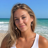 Sandy blonde model wearing pearl marquise sterling silver earrings on sunny Florida beach — handmade in California — Crabby Mermaid