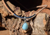Larimar Teardrop Necklace on 3 mm cork with Sterling Silver Bars

Eco-friendly, sustainable cork - 18" long

Dimension Teardrop Pendant is .5" 

Designed and Made in the USA 

Strong Magnetic Clasp for easy on and off