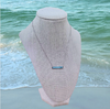 Larimar bar necklace on linen display bust showing full chain length — genuine Larimar coastal jewelry — Crabby Mermaid