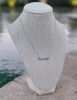 Larimar bar pendant necklace on linen display bust close up — adjustable sterling silver chain — Crabby Mermaid