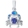Tanzanite and blue opal crab pendant in .925 sterling silver on white background — Crabby Mermaid