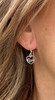 Just Love Heart Dangling .925 Sterling Silver Earrings

Add a touch of romance with our beautiful LOVE dangling earrings made of Sterling Silver. Nothing says love like fine jewelry; when you wear these beautiful heart-shaped earrings, you're sure to shimmer. Perfect for any occasion, whether a day at work, date-night top, or lunch with friends, pair them with any outfit. These must-have earrings are timeless, and you will love wearing them for years to come!

Pair these earrings with our fun Classic Silver Heart Anklet and one of our many heart necklaces, an excellent way to top off your look.