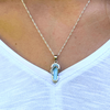 Larimar flip flop necklace worn on model showing pendant size and chain length — hand assembled by Crabby Mermaid
