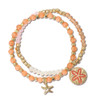 Coral and gold beaded sea life stretch bracelet set with starfish and sand dollar charms — coastal jewelry — Crabby Mermaid