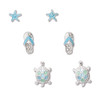 Silver-toned starfish, flip flop, and sea turtle stud earrings with blue enamel and crystal accents on white background — coastal earring set — Crabby Mermaid