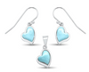 Genuine Larimar heart necklace and earring set close-up in sterling silver on white background — Dominican Republic Larimar — Crabby Mermaid