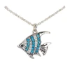 Silver-toned aqua and clear crystal angel fish pendant necklace on white background - coastal jewelry - Crabby Mermaid