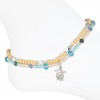 Double layer sea turtle beaded anklet with wooden beads and blue teal crystal beads on white background — coastal beach anklet — Crabby Mermaid