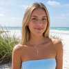 Larimar palm tree sterling silver necklace worn on model at Florida Gulf Coast beach — genuine Dominican Republic Larimar — Crabby Mermaid