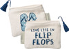 Live Life In Flip Flops Zipper Wallet

Life is definitely better in flip-flops! Let everyone know your opinion with this adorable double-sided cotton coin purse featuring intricate, age-old block carving and printmaking techniques with its "Live Life In Flip Flops" sentiment and reverse flip-flop design in shades of blue. This coastal-inspired walled / coin purse includes a top zip closure with matching tassel detail. This chic accessory is an excellent gift idea for any beach lover; add some cash or a gift card to make it extra special.

Dimensions:5.25" x 3.25"
Material: Cotton, Metal