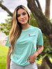 Patriotic Mermaid Short Sleeve Tee - Aqua

Our Patriotic Mermaid Tee is the perfect addition to any mermaid lover's wardrobe. Show your American Pride in our Crabby Mermaid Orginal Patriotic Tee. Made of organic and sustainable cotton, this super soft unisex tee is so comfy you'll never want to take it off. Wear it to the beach or out on the town; you're sure to catch some attention with this bright and colorful graphic tee, exclusive to Crabby Mermaid. Pair with your favorite shorts, jeans, or capris for a casual look, or dress it up a little by wearing it with a skirt. This shirt also comes in Azure; grab one of each!