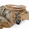 Sterling silver fish hook necklace on braided cork displayed on natural cork slab - white background - Crabby Mermaid