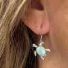 Natural Larimar Turtles .925 Sterling Silver Drop Dangle Earrings

These beautiful Sterling Silver Turtle dangle drop earrings are a turtle lover's delight. Made with genuine Larimar stones, the 1" long pendant is constructed with a french hook back for easy on and off. 

Check out our entire collection of Larimar jewelry for other unique products.

ABOUT THE EARRINGS

1" Larimar & Sterling Silver Turtle 
Genuine Larimar Gemstone