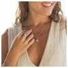 Woman wearing sterling silver sapphire starfish and pearl necklace with matching starfish ring - handcrafted in Ireland - Crabby Mermaid
