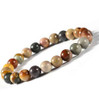 Polychrome jasper gemstone beaded stretch bracelet with multicolor earthy tone beads on white background — Crabby Mermaid