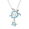 Sterling silver mother and baby sea turtle necklace with aqua crystals - close-up pendant detail - handcrafted in Ireland - Crabby Mermaid