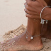 Sterling silver starfish drop anklet with aqua Swarovski crystals on white background - adjustable chain - handcrafted in Ireland
