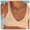 Sterling silver whale tail necklace with pearl drop worn on model — Dublin Assay Office hallmarked Irish coastal jewelry