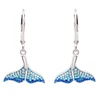 Sterling silver whale tail drop earrings with ombre blue crystals and lever-back closures on white background - handcrafted in Ireland - Crabby Mermaid
