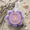 Spongellé French Lavender Wild Flower buffer surrounded by dried lavender sprigs and seashells on beach sand - Crabby Mermaid