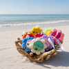 Spongellé Wild Flower body wash buffer collection in multiple scents in driftwood basket on Florida Gulf Coast beach — Crabby Mermaid