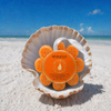 Spongellé Lily of the Valley Wild Flower body wash buffer nestled in seashell on white sand Florida beach - Crabby Mermaid