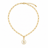 Gold paperclip chain necklace with white epoxy seahorse charm on white background - Crabby Mermaid