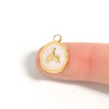 White epoxy whale tail charm shown on fingertip for scale - gold paperclip chain necklace - Crabby Mermaid