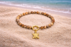 picture jasper gemstone bracelet with gold turtle charm holder coastal jewelry