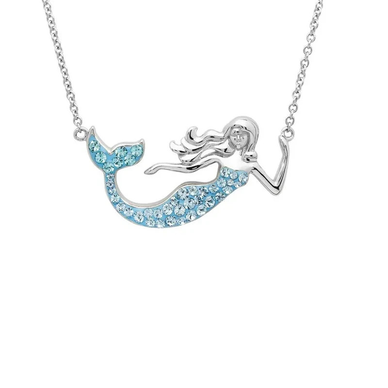 Sterling silver aqua Swarovski crystal mermaid necklace on white background - handcrafted in Ireland - Crabby Mermaid