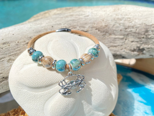 Close-up of sterling silver crab charm on glazed teal and beige ceramic bead cork bracelet ‚Äî 7 inch Florida artisan bracelet ‚Äî Crabby Mermaid